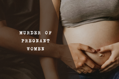Pregnant woman holding her belly, symbolizing the risk of domestic violence and homicide during pregnancy