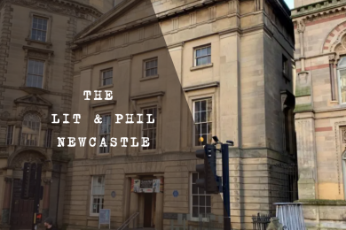 Photograph of the historic, multi-tiered book-lined interior of The Lit & Phil library in Newcastle upon Tyne.